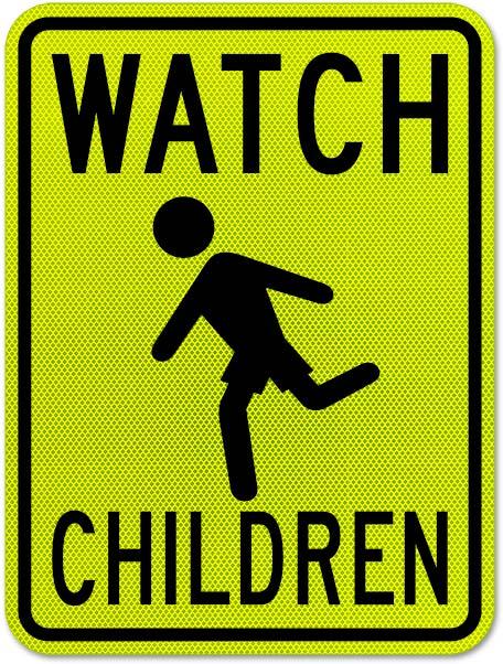 A yellow road sign that reads "WATCH CHILDREN" and features a running person figure wearing shorts.